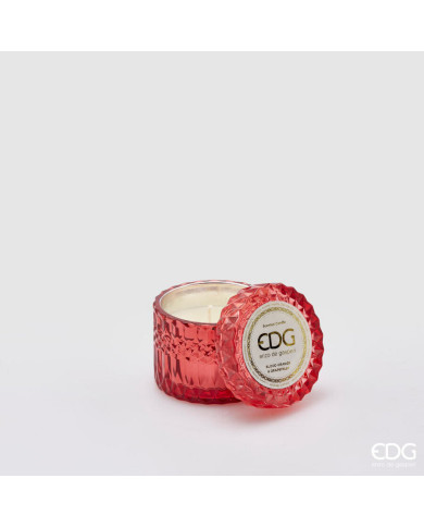 Candela profumata "Crystal new". cera. contenitore in vetro. h. 8.5 diametro 9 col. rosa. essenza: orange