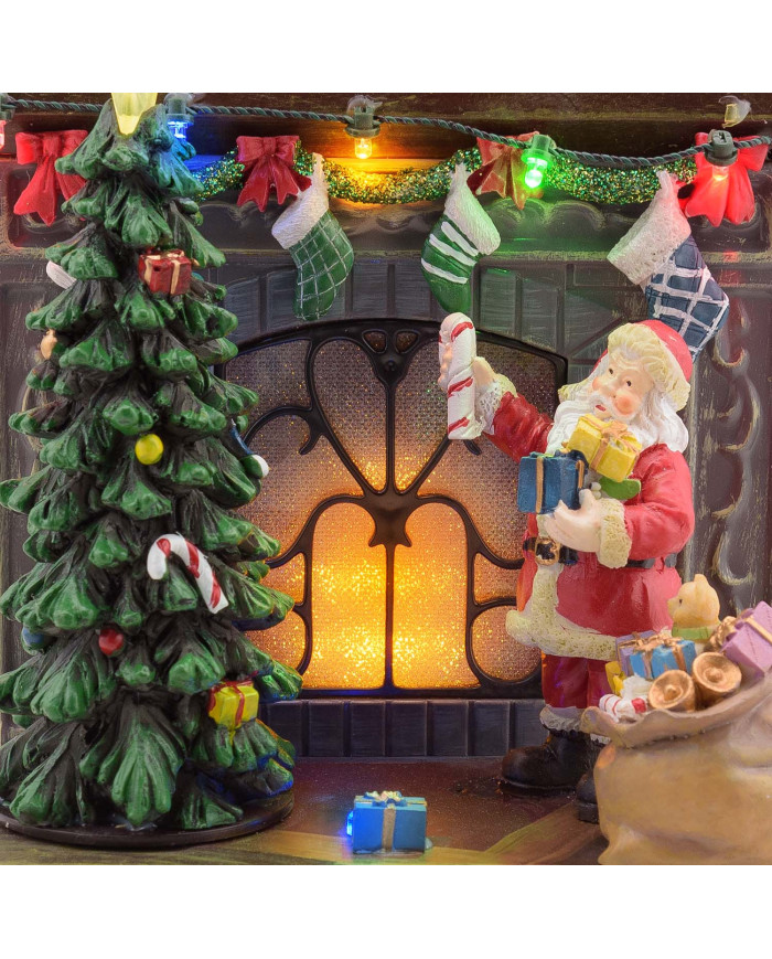 Villaggio "babbo con caminetto", con led e musica, h. 20 cm. Villaggio "babbo con caminetto", con led e musica, h. 20 cm.