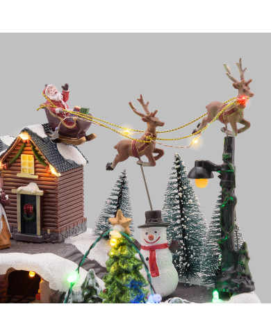 Villaggio "babbo con renne", h. 23 cm, con led  e  musica Villaggio "babbo con renne", h. 23 cm, con led  e  musica